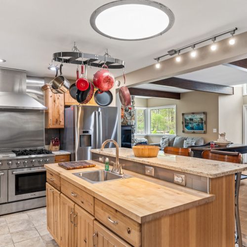 Kitchen View to Living Room and Dining Area
