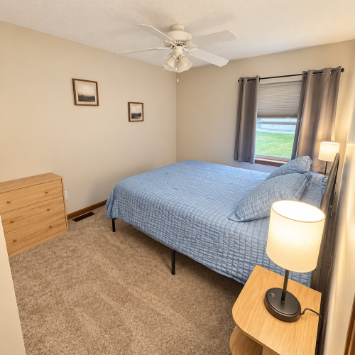 Bedroom 3 – View 2: Additional view of Bedroom 3, highlighting the queen-size bed and room layout.