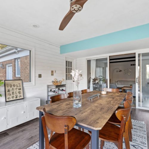 Willow on the Pond - Four season dining area connected to the sitting area via sliding glass doors, which can be closed off for added privacy.