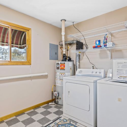 Laundry room in upper unit