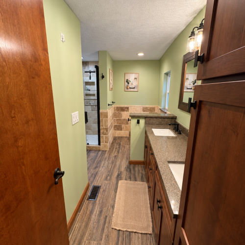 Master bath double-sink vanity providing plenty of counter space and storage for guests.