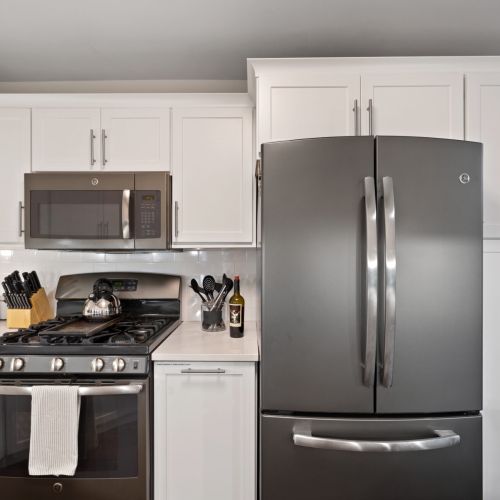 Fully equipped kitchen with modern appliances.
