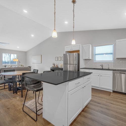 Open-concept kitchen and living room, perfect for relaxing or entertaining.