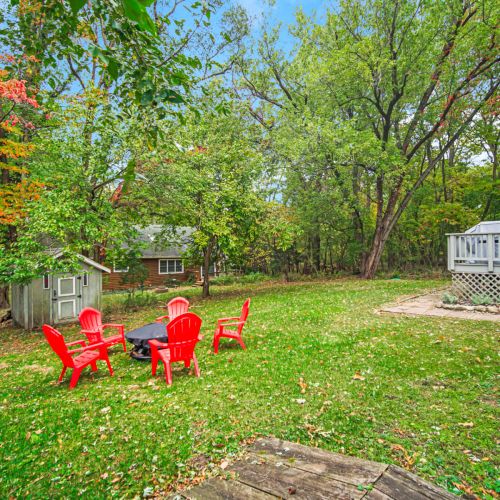 Backyard with a raised firepit.