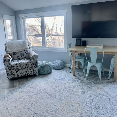 Living Room with Smart TV, table & 4 chairs.