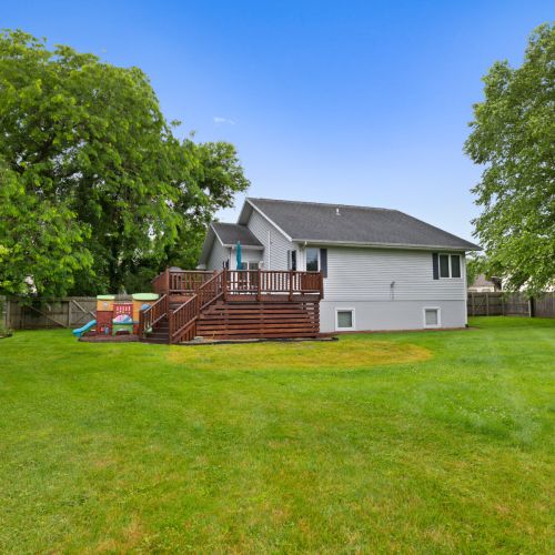 View of the back yard and deck.