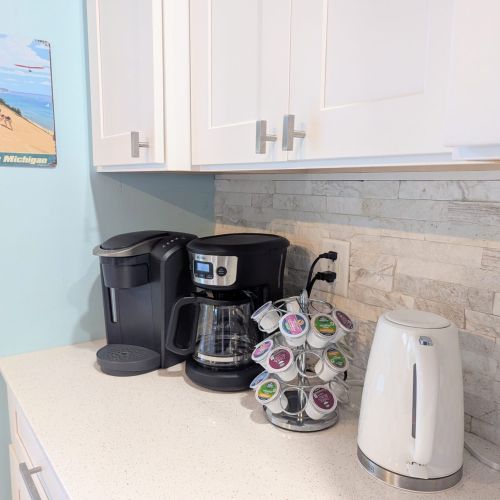 Coffee lovers rejoice — drip coffee maker, Keurig, and hot water kettle all ready to go.