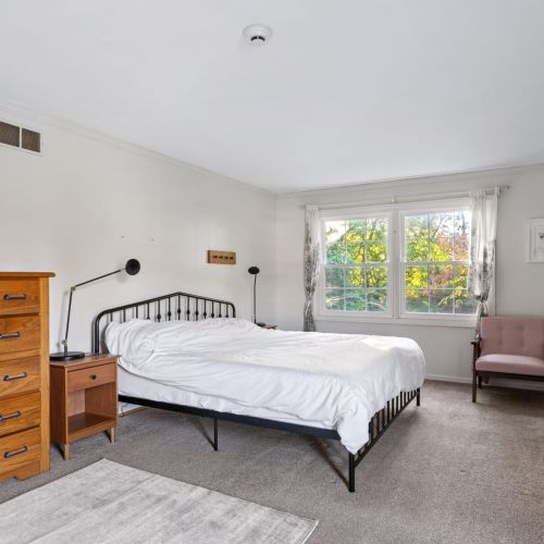 Master bedroom with king size bed.
