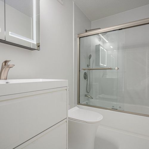 Full bathroom 1 with a tub and shower.