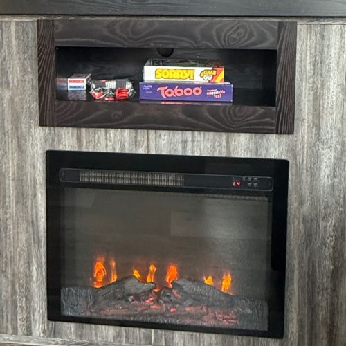 Relax by the gas fireplace and enjoy a selection of family games for entertainment.