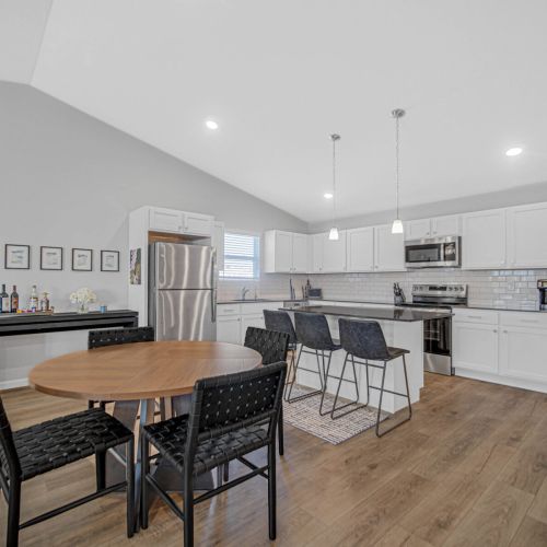 Another view of the kitchen with modern appliances.
