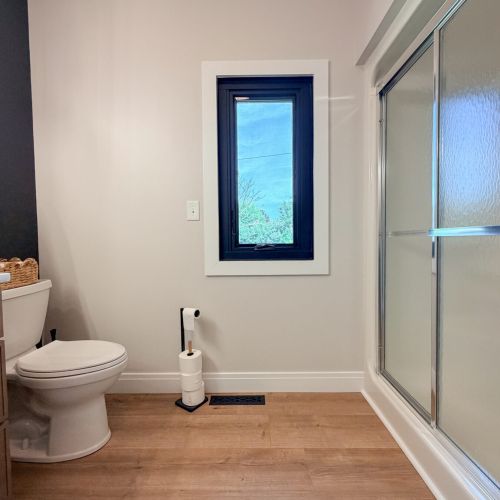 Walk-in shower with a clean, comfortable design for everyday use.