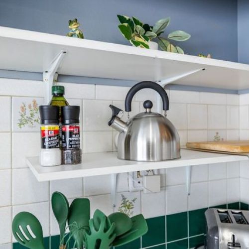 Some of the kitchen amenities include a toaster, electric kettle, cutting board, cooking utensils, and salt & pepper for your convenience.