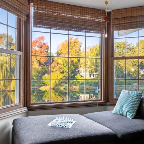 Willow on the Pond - Relax and enjoy a game of chess or a good book from this cozy nook overlooking the water.